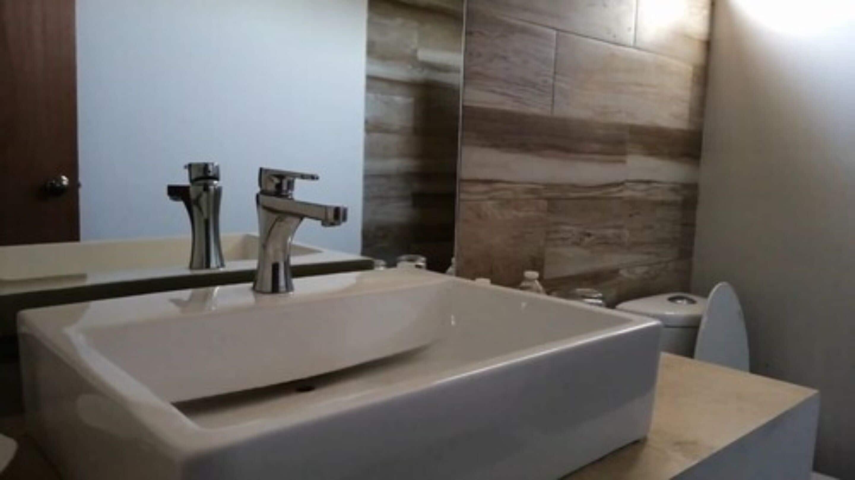 deluxe twin room, beach view | bathroom | shower, free toiletries, towels, soap