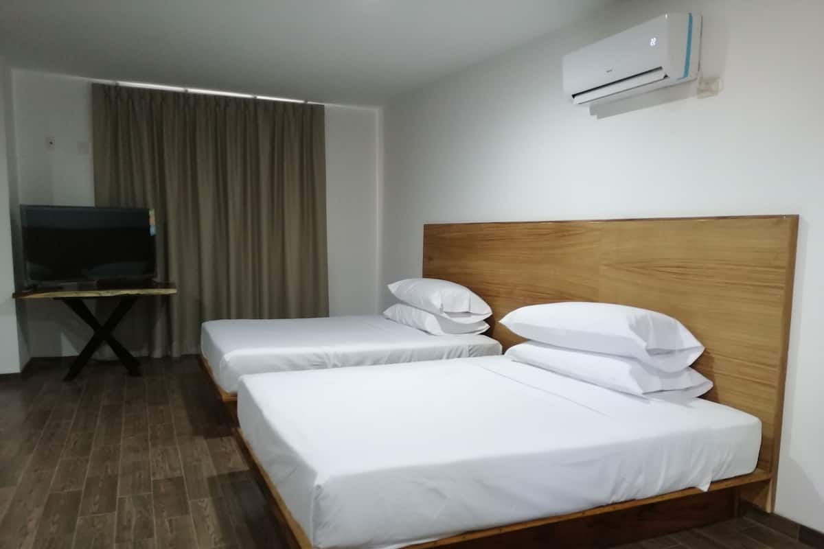 Deluxe-værelse med 2 enkeltsenge - strandudsigt | 1 soveværelse, minibar, skrivebord, mørklægningsgardiner