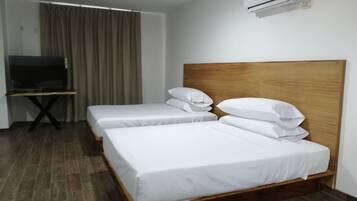 Deluxe Twin Room, Beach View | 1 bedroom, minibar, desk, blackout drapes