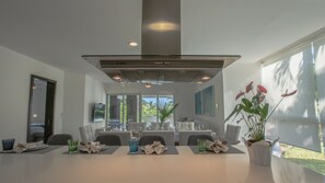 Enjoy meals in this dining area with a view of the outdoors.