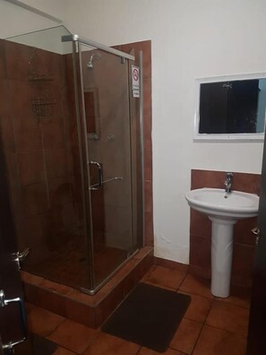 Standard Room | Bathroom | Shower, free toiletries, towels, soap