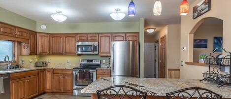 Microwave, dishwasher, coffee/tea maker, cookware/dishes/utensils