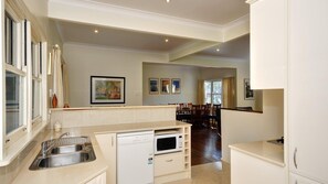 Fridge, microwave, oven, stovetop - Summer Cottage - Bowral Street (Hawks Nest)