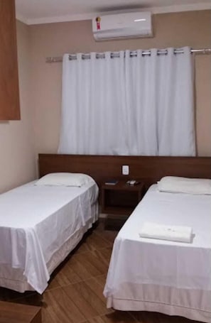 Twin Room | Desk, blackout drapes, iron/ironing board, free WiFi - Premium Hotel (Frutal)