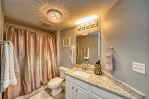 Combined shower/bathtub, hair dryer, towels, soap