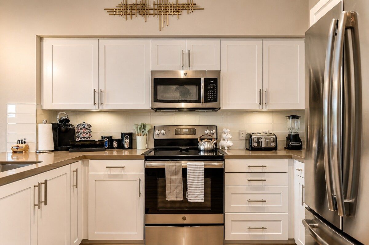 Fully equipped kitchen with stainless appliances