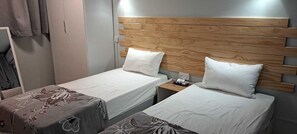 2 habitaciones, tabla de planchar con plancha, wifi y ropa de cama 