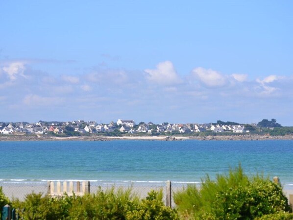 On the beach, sun loungers, beach towels