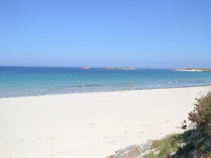 On the beach, sun-loungers, beach towels