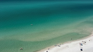 On the beach, sun loungers