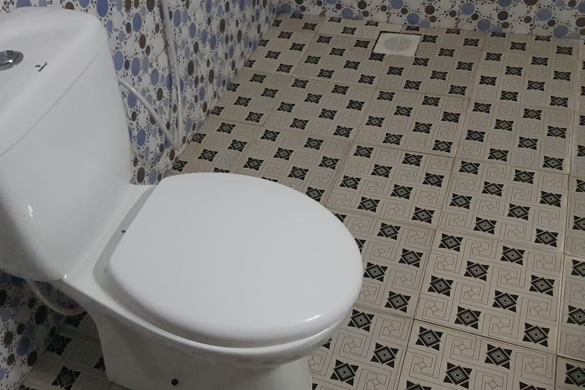Shower, bathrobes, slippers, bidet