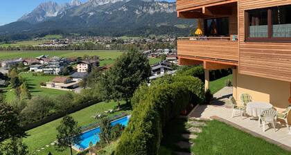 Charming family apartment with mountain views, 2 bed- and bathrooms and balcony