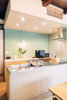 Full-size fridge, microwave, stovetop, electric kettle