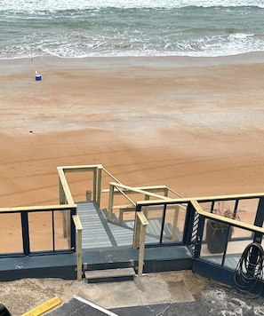 On the beach, sun-loungers, beach umbrellas, beach towels