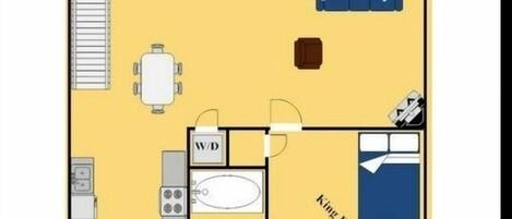 Indeling van een hotelkamer met een kingsize slaapkamer, een queensize slaapgedeelte, een wasruimte met wasmachine en droger, en een kitchenette.