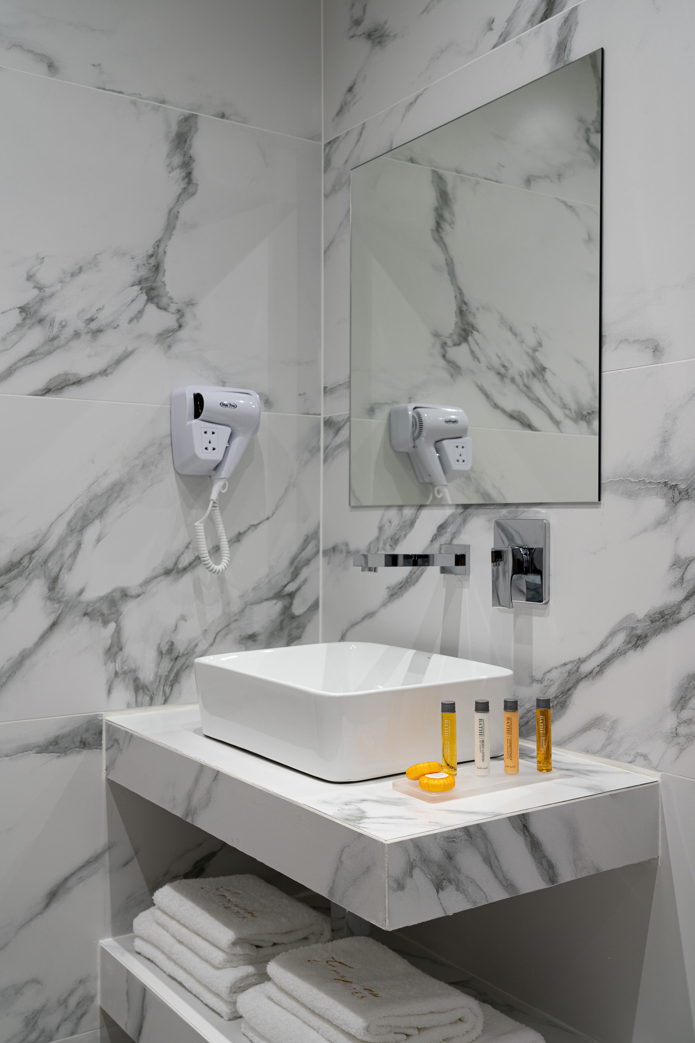 shower, free toiletries, hair dryer, slippers