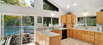 Dog-friendly riverfront cabin w/ Private Hot Tub, Wood Stove, near Ski resort