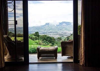 Mountain Luxury Mansion valley and city lights view.