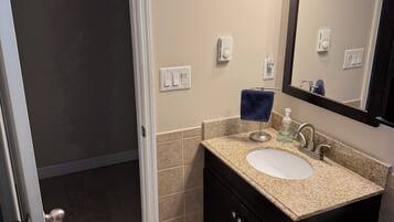 Hair dryer, towels, soap, shampoo