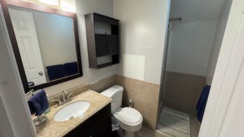 Hair dryer, towels, soap, shampoo