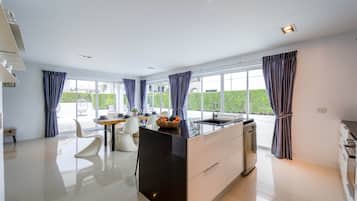 Family Villa | Living area | Flat-screen TV