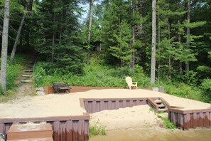 Property grounds - Quiet Lakefront Cabin with Private Fire Pit, Beach and Dock (Alger)