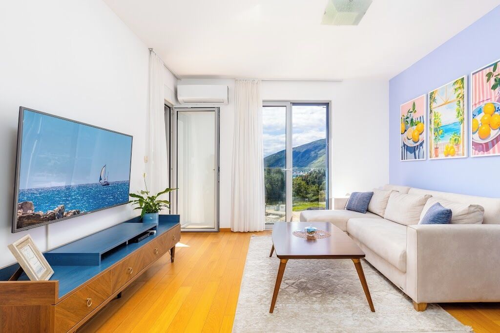 Apartment, 1 Bedroom | Living area | 125-cm Smart TV with cable channels