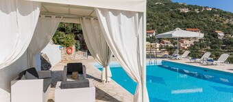 Villa Andonis Nissaki is a large villa with a private large pool and sea view.