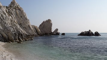 Plage, chaises longues
