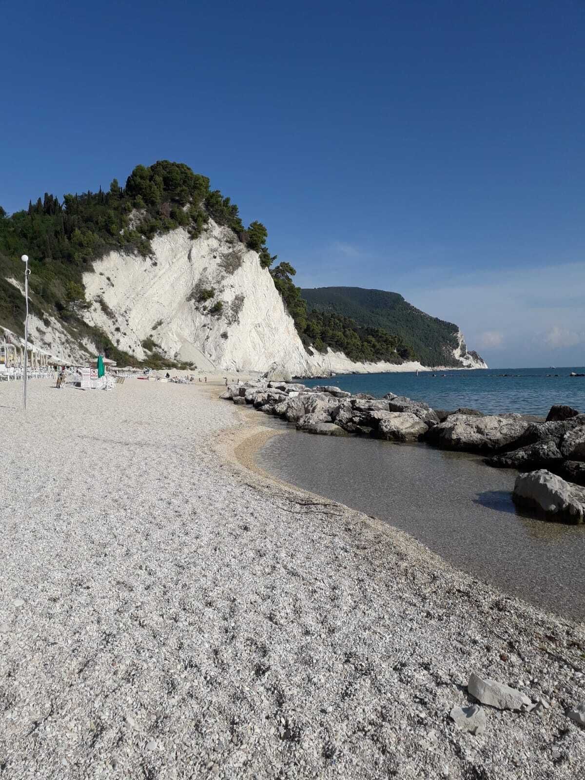 On the beach, sun loungers