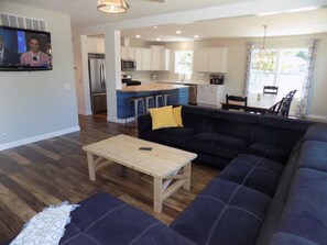 TV, books - NEWLY BUILT 7 Bedroom Lake Shore Drive Beach Home - Hot Tub and Fire Pit! (Michigan City)