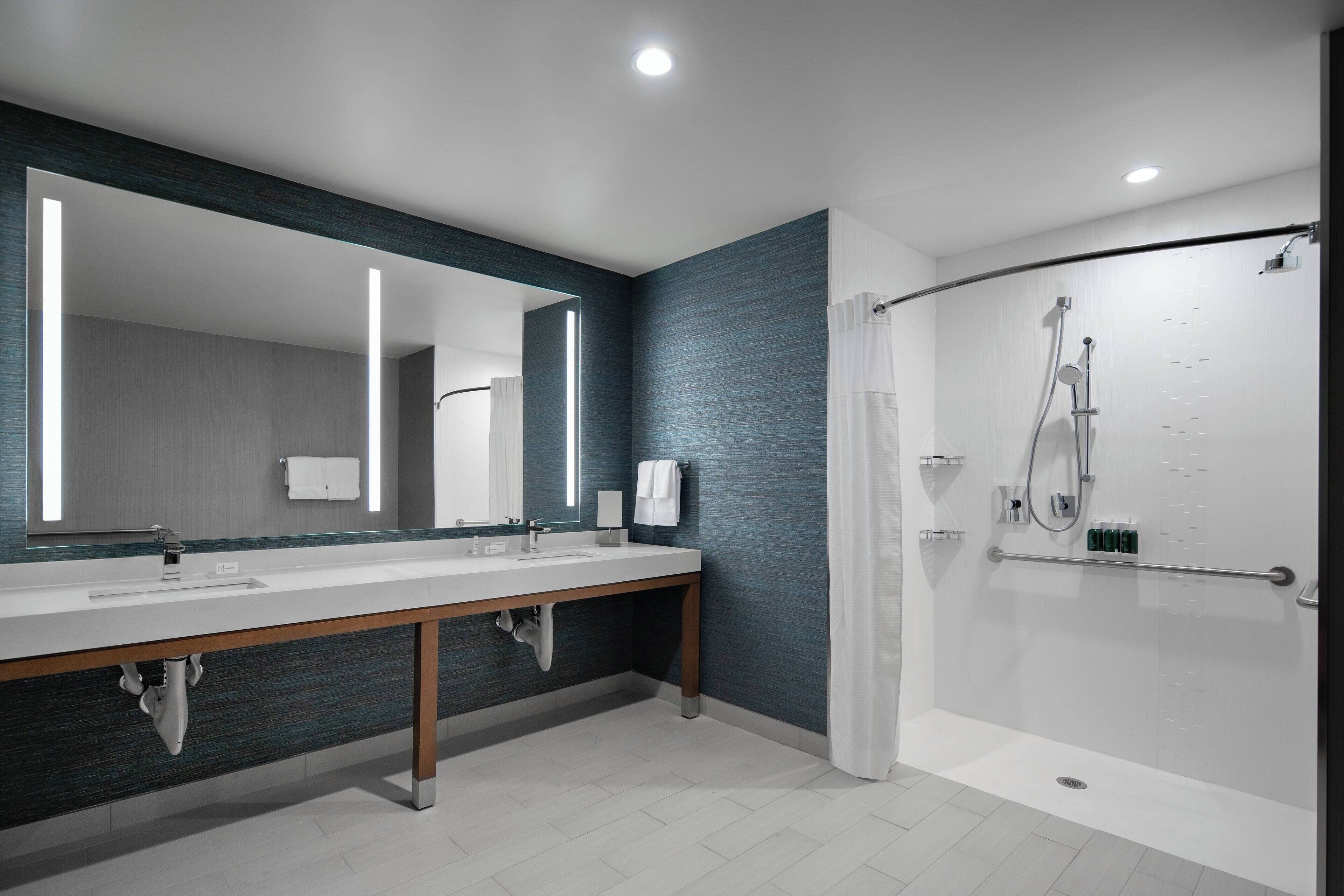 suite, 2 queen beds, balcony | bathroom | shower, free toiletries, hair dryer, towels