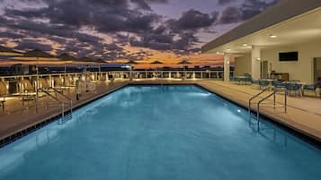 Outdoor pool, open 6:00 AM to 10:00 PM, pool umbrellas, pool loungers