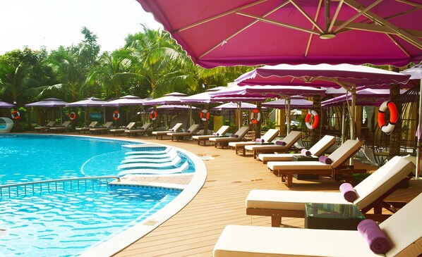 Outdoor pool, open 6:00 AM to 9:00 PM, pool umbrellas, pool loungers