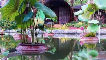 Triple Bungalow With Pool View | Minibar, in-room safe, desk, laptop workspace