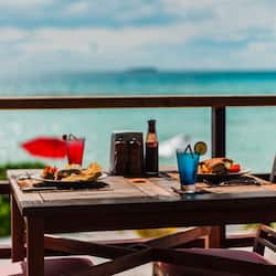 Breakfast, lunch, dinner served; Asian cuisine, beach views