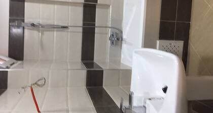 Apartment in a private residence with caretaker
