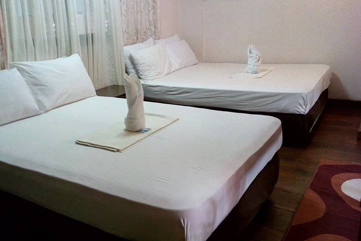 Family Room | Desk, bed sheets