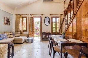 Apartment, 1 Bedroom, Balcony | Living area | Flat-screen TV - The Old Symi (Symi)