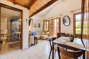 Apartment, 1 Bedroom, Balcony | Living area | Flat-screen TV - The Old Symi (Symi)