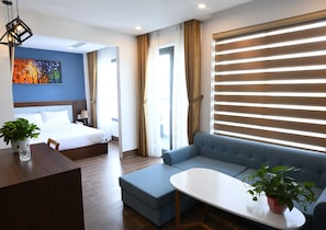 Luxury Apartment, Kitchenette | Individually decorated, desk, laptop workspace, blackout drapes