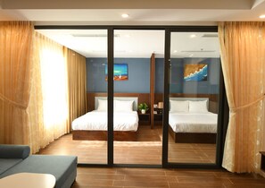 Deluxe Apartment, Kitchenette | Individually decorated, desk, laptop workspace, blackout curtains - Smeraldo Hotel & Apartment (Da Nang)