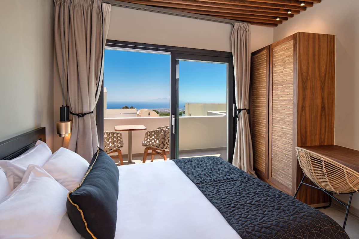 Deluxe Double Room, Ocean View | 1 bedroom, memory foam beds, in-room safe, desk