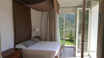Suite (Panoramica) | 1 bedroom, premium bedding, down comforters, individually decorated