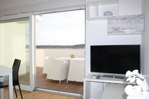 Apartment, 3 Bedrooms | Living area | Flat-screen TV - Apartments Orange (Novalja)