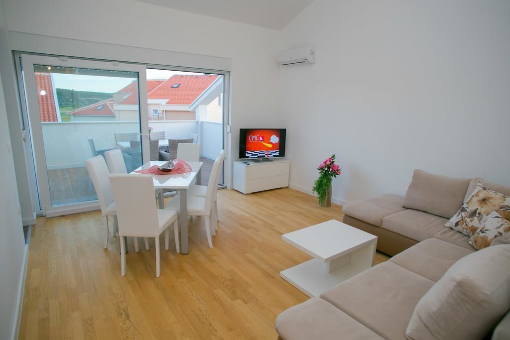 Apartment, 3 Bedrooms | Living area | Flat-screen TV