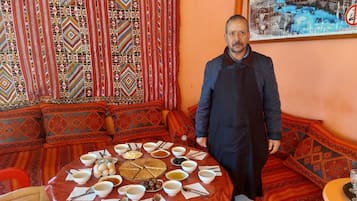 Breakfast, lunch, dinner served; local cuisine