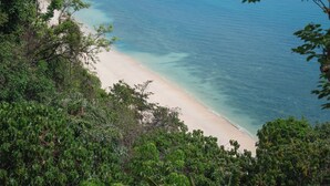A coastal landscape with a beach, clear water, and a pier extending into the sea. - 4BR Residence Pool Villa Ocean View - Sri panwa (G11) (Phuket)