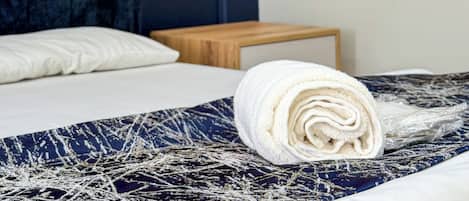 Frette Italian sheets, premium bedding, memory-foam beds, minibar