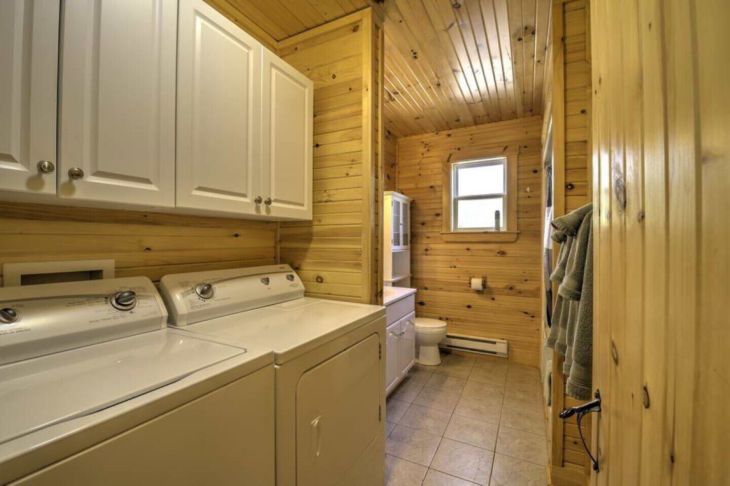 Combined shower/bathtub, towels, soap, toilet paper